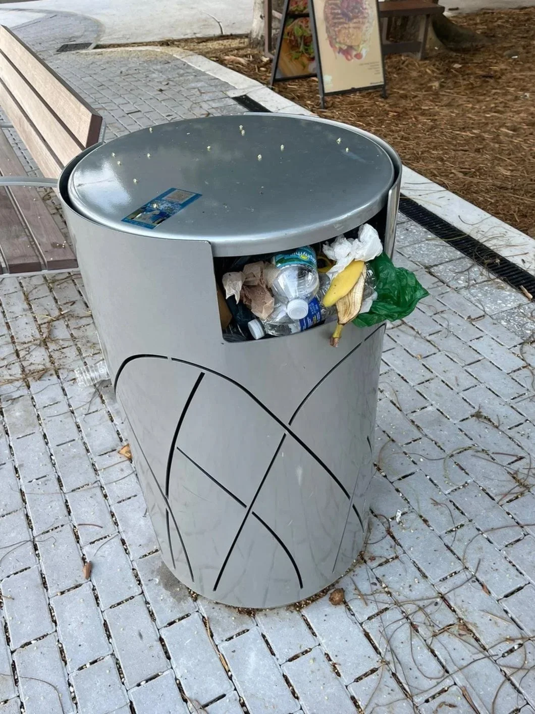Trash receptacle along the Brickell Baywalk