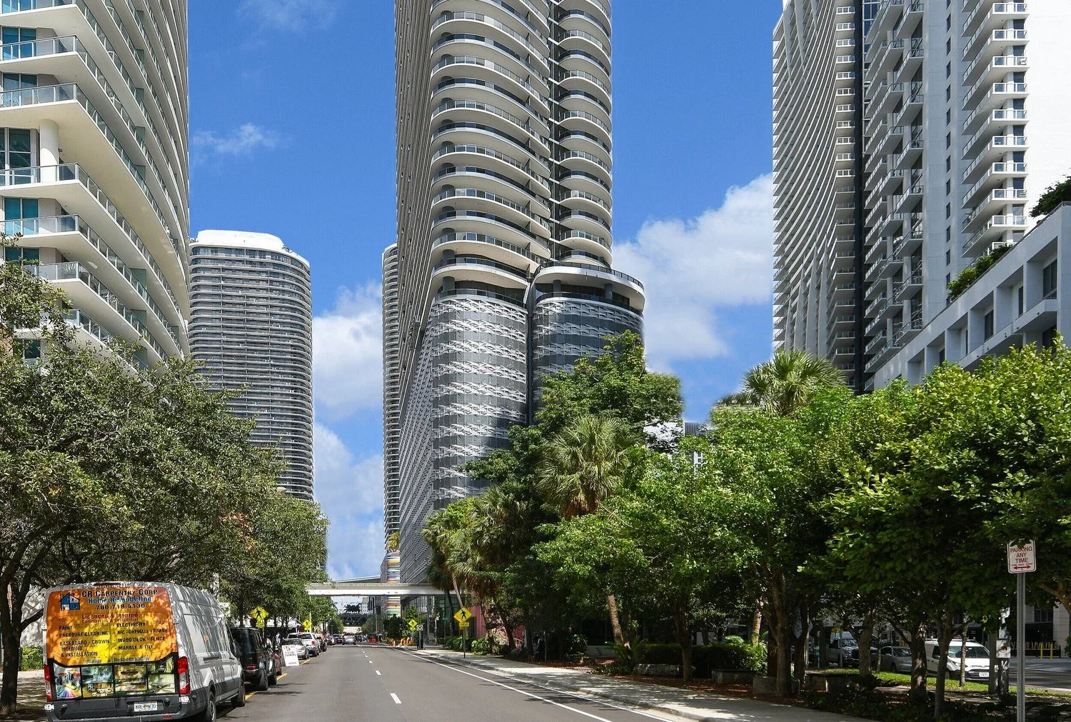 The landscaped Flatiron park and former sales-gallery area below the surrounding Brickell towers, shown in a 2021 photograph