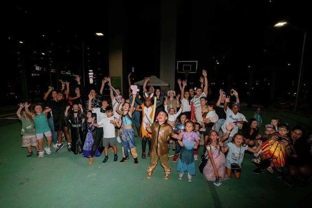 Families celebrating together in their costumes in 2025